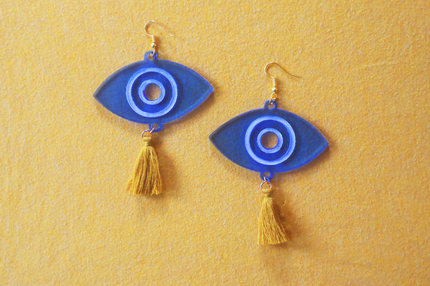 Evil Eye Acrylic Earrings with Goldenrod Tassles